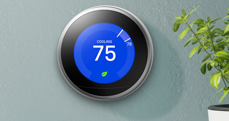Nest thermostat on wall