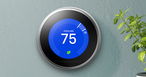 Nest thermostat on wall