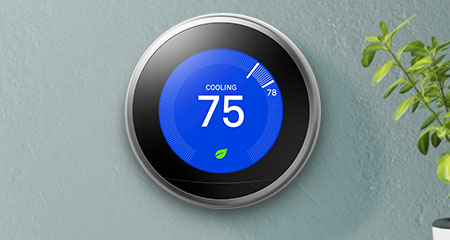 Nest thermostat on wall